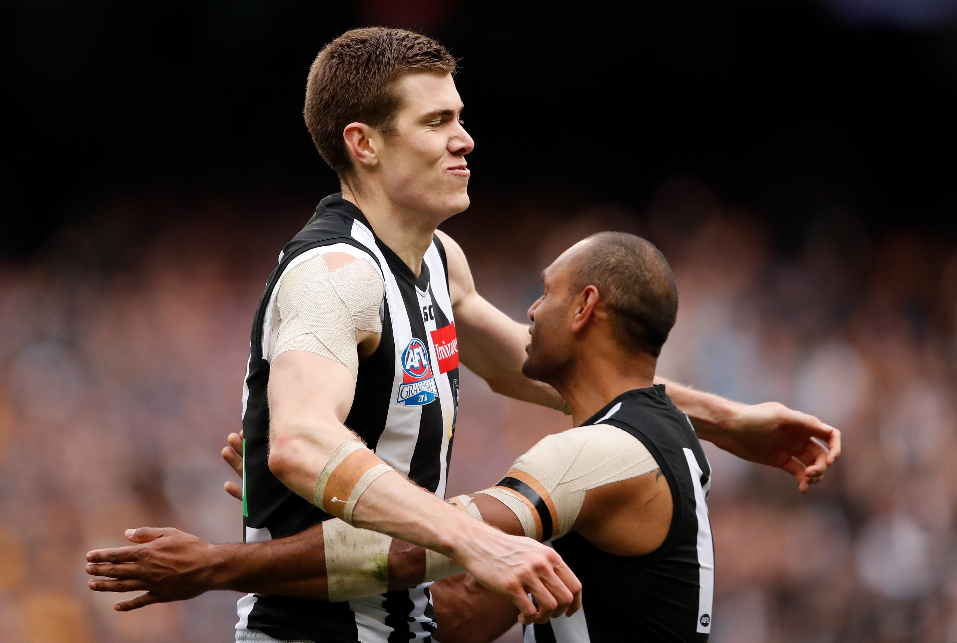 Collingwood stands with Varcoe and Cox