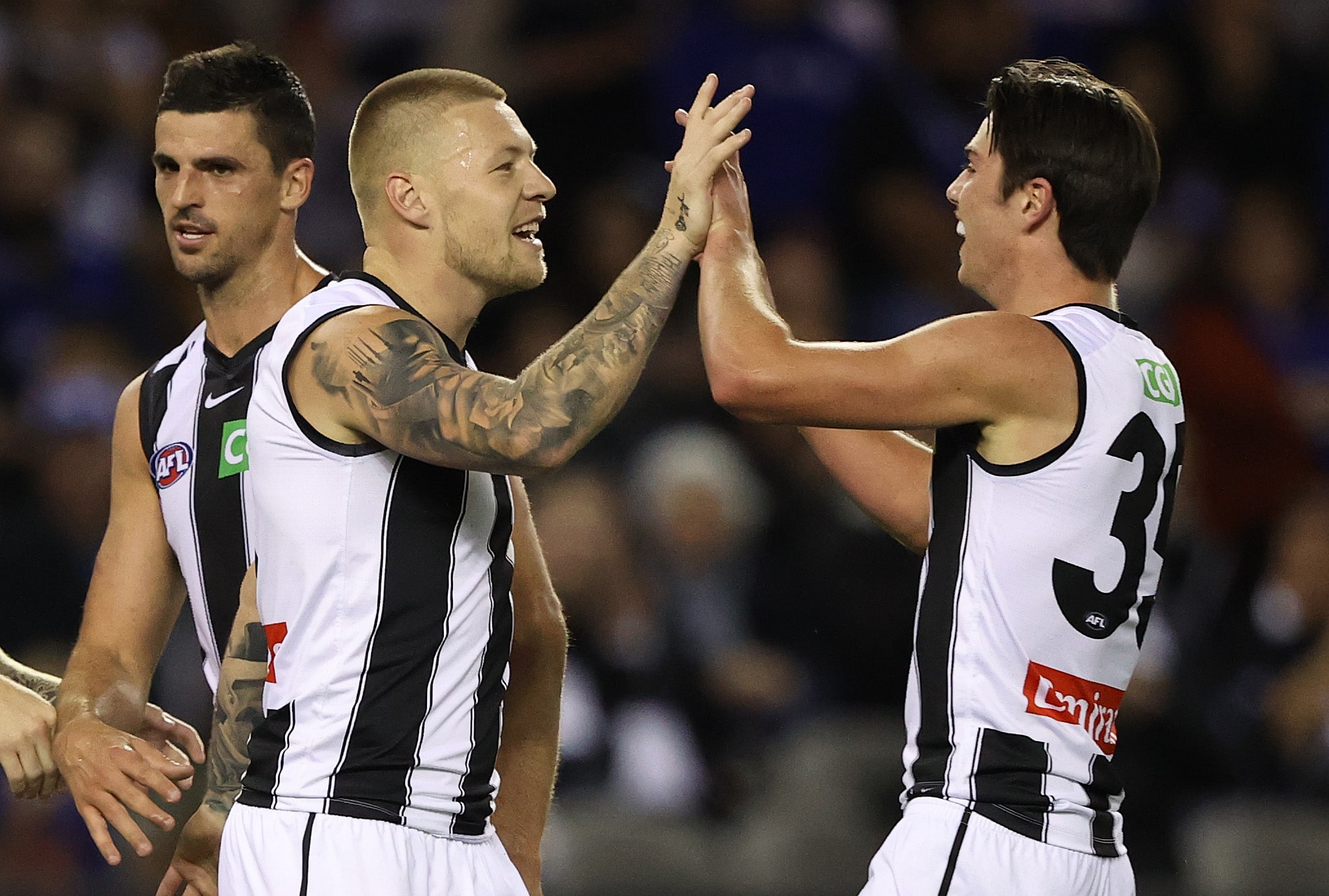 Six-goal De Goey gets Magpies home over Roos